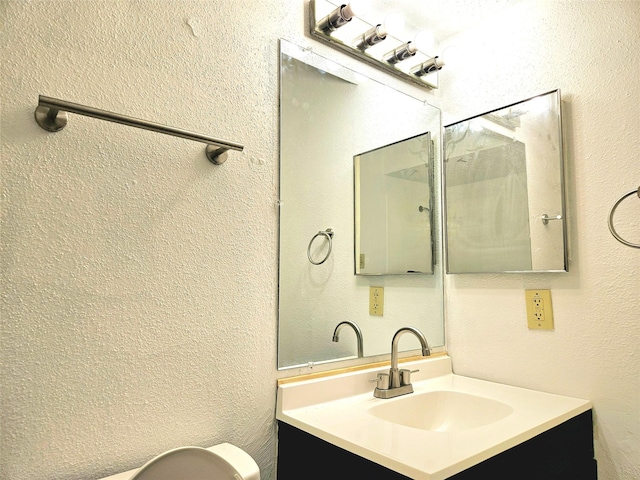 5670 Birchmont Dr Unit C, Houston, TX 77091 - bathroom with vanity and toilet