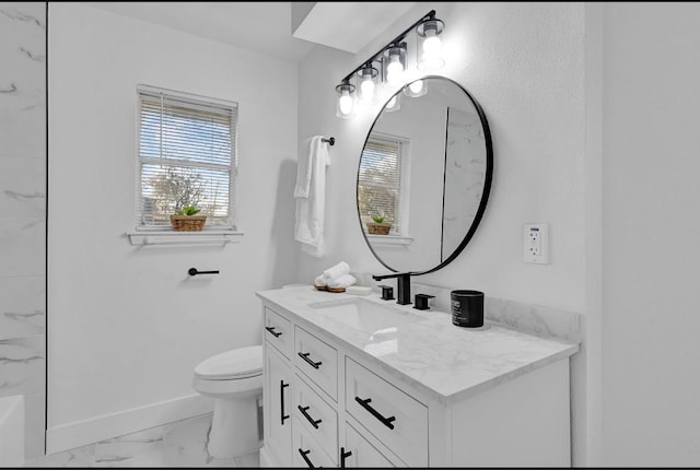 20310 County Road 510f, Brazoria, TX 77422 - bathroom featuring marble look tiles, plenty of natural light, baseboards, and vanity
