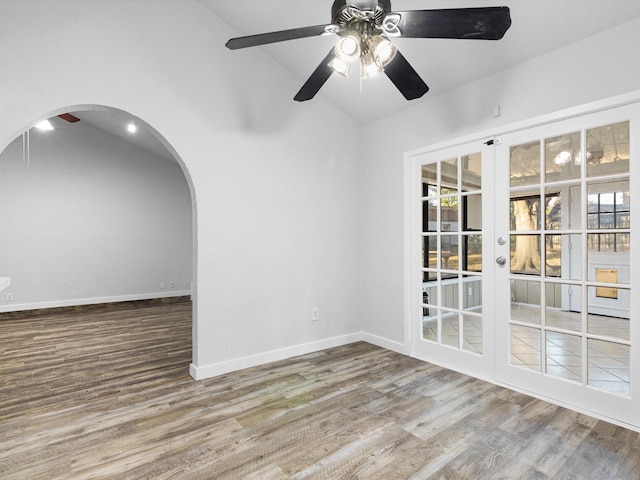 3808 Williams Rd, Benbrook, TX 76116 - unfurnished room with lofted ceiling, plenty of natural light, french doors, and wood finished floors