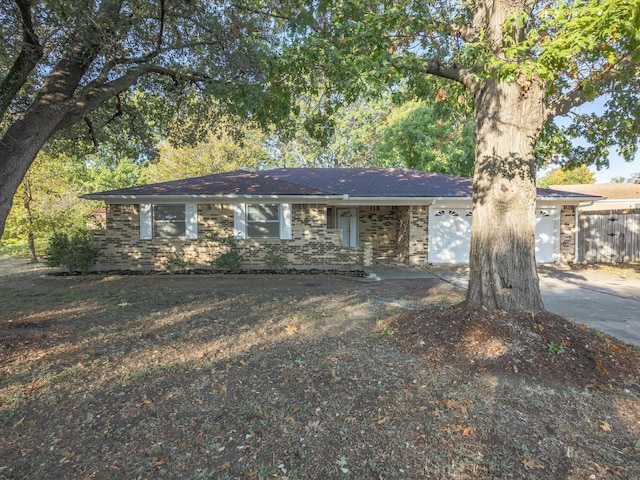 3808 Williams Rd, Benbrook, TX 76116 - ranch-style home featuring a garage, concrete driveway, and brick siding
