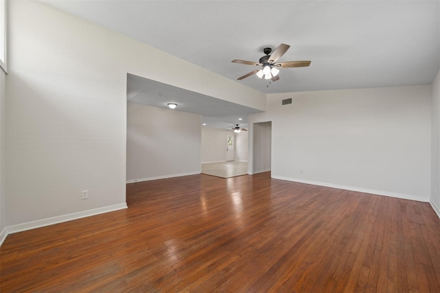 127 E Thornton Rd, Houston, TX 77022 - empty room with a ceiling fan, wood finished floors, and baseboards
