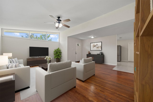 127 E Thornton Rd, Houston, TX 77022 - living room with ceiling fan and wood finished floors