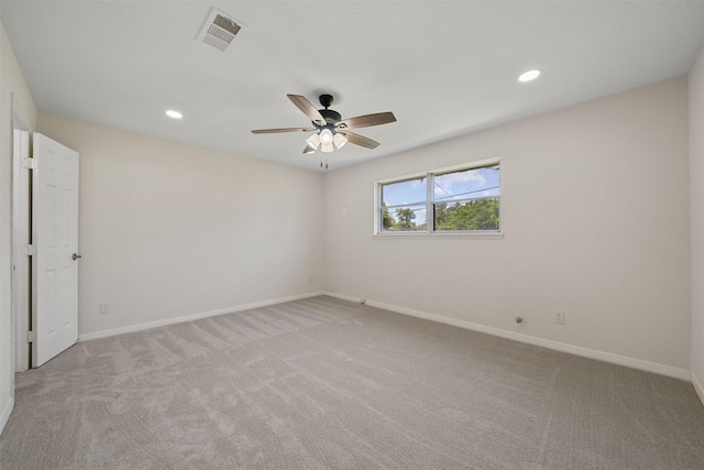 127 E Thornton Rd, Houston, TX 77022 - unfurnished room with light carpet, baseboards, ceiling fan, and recessed lighting