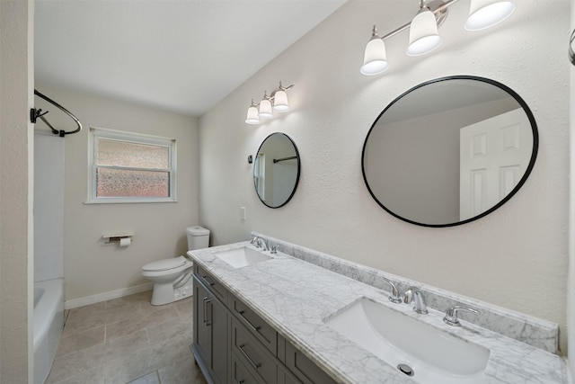 127 E Thornton Rd, Houston, TX 77022 - bathroom featuring toilet, double vanity, washtub / shower combination, and tile patterned flooring