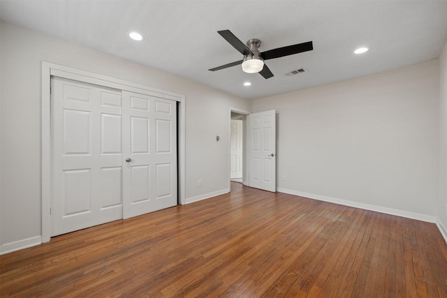 127 E Thornton Rd, Houston, TX 77022 - unfurnished bedroom with hardwood / wood-style flooring, baseboards, a closet, recessed lighting, and a ceiling fan
