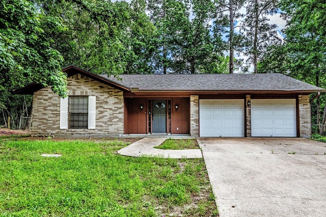 224 Olive St, Huntsville, TX 77340 - ranch-style house featuring an attached garage, driveway, brick siding, a front lawn, and a shingled roof