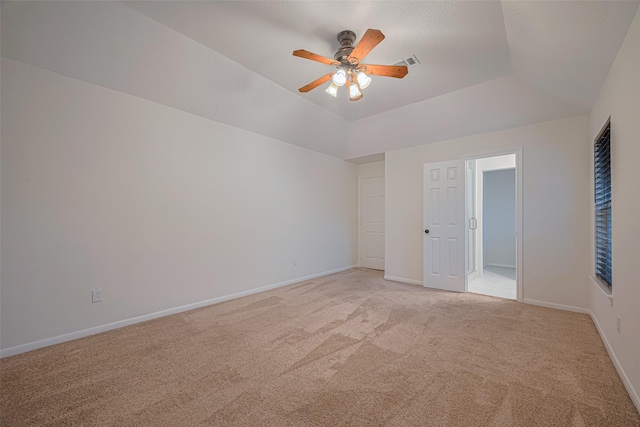 5918 Pendelton Place Dr, Sugar Land, TX 77479 - spare room featuring light colored carpet, a ceiling fan, baseboards, and a raised ceiling