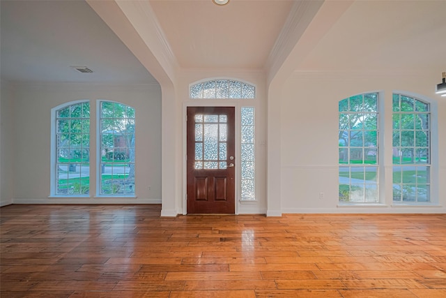 5918 Pendelton Place Dr, Sugar Land, TX 77479 - foyer with crown molding, hardwood / wood-style flooring, and baseboards