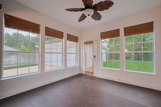 5918 Pendelton Place Dr, Sugar Land, TX 77479 - unfurnished sunroom featuring baseboards