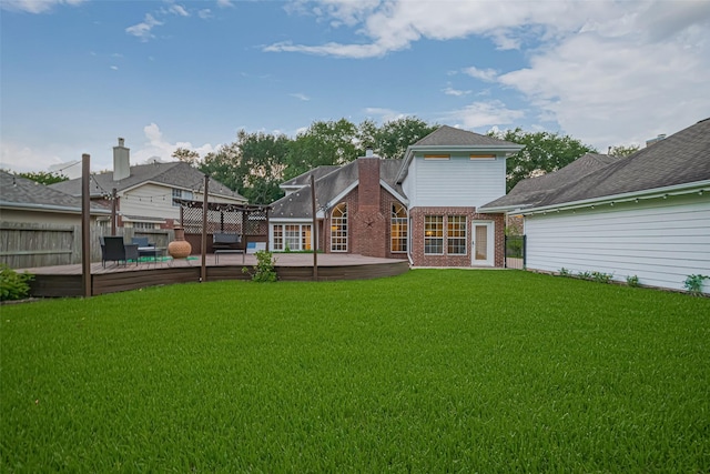 5918 Pendelton Place Dr, Sugar Land, TX 77479 - rear view of house with a wooden deck and brick siding