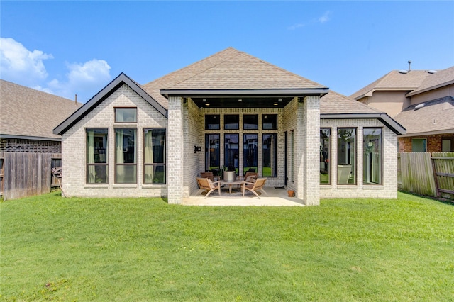 16927 Lupine Meadow Ln, Humble, TX 77346 - rear view of property featuring brick siding, a patio area, and roof with shingles