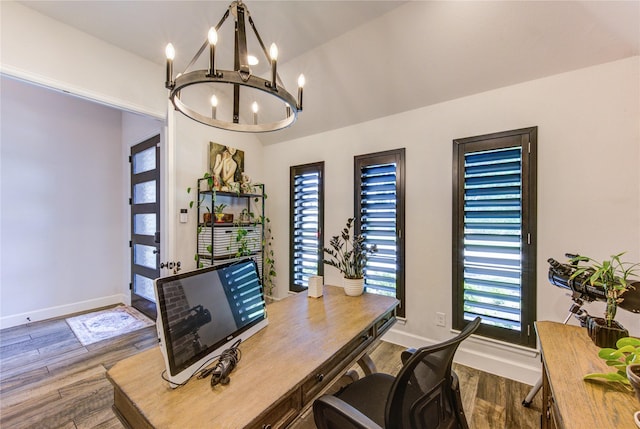 16927 Lupine Meadow Ln, Humble, TX 77346 - office space with a chandelier, wood finished floors, baseboards, and vaulted ceiling