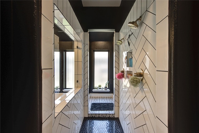 16927 Lupine Meadow Ln, Humble, TX 77346 - bathroom with tile patterned floors and a shower