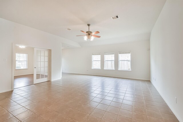 13507 Marblepointe Ln, Cypress, TX 77429 - unfurnished room featuring a ceiling fan, french doors, light tile patterned floors, and baseboards