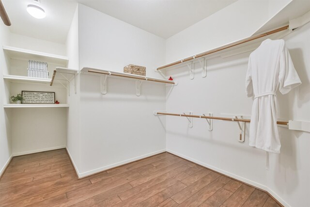 13507 Marblepointe Ln, Cypress, TX 77429 - walk in closet with wood finished floors