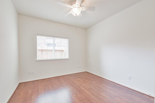 13507 Marblepointe Ln, Cypress, TX 77429 - unfurnished room featuring wood finished floors, a ceiling fan, and baseboards