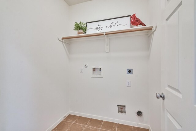13507 Marblepointe Ln, Cypress, TX 77429 - laundry area with electric dryer hookup, baseboards, washer hookup, gas dryer hookup, and tile patterned floors