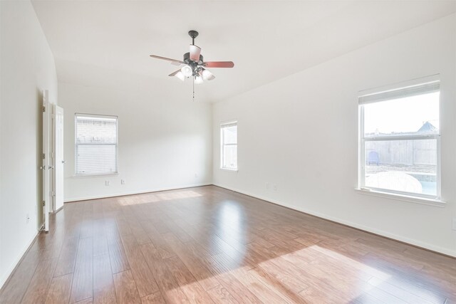 13507 Marblepointe Ln, Cypress, TX 77429 - spare room featuring ceiling fan, wood finished floors, and baseboards