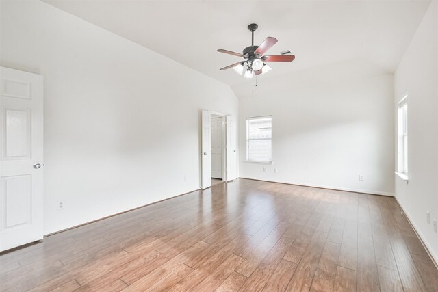 13507 Marblepointe Ln, Cypress, TX 77429 - empty room featuring ceiling fan, light wood-style floors, lofted ceiling, and baseboards