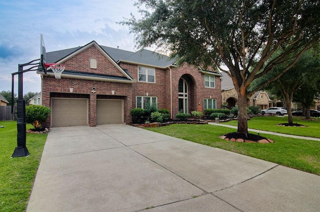 11307 Bentgrove Ln, Cypress, TX 77433 - traditional-style home with brick siding, a front yard, driveway, and a garage