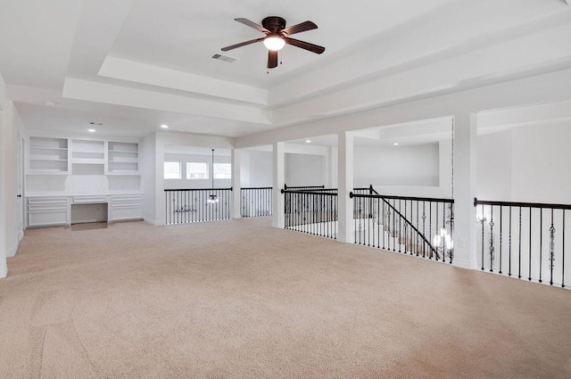 11307 Bentgrove Ln, Cypress, TX 77433 - carpeted empty room featuring a ceiling fan, a tray ceiling, and recessed lighting