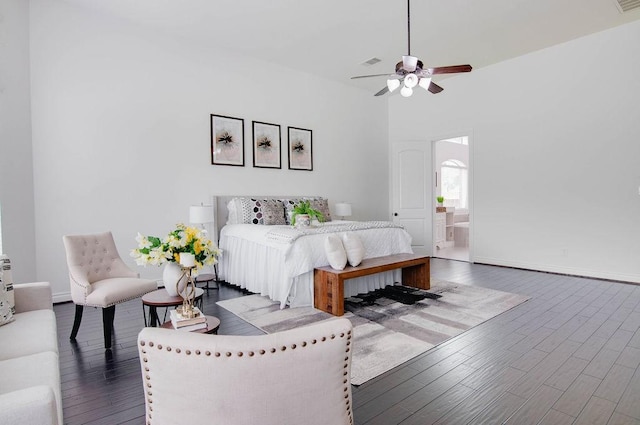 11307 Bentgrove Ln, Cypress, TX 77433 - bedroom featuring wood finished floors, baseboards, and ensuite bathroom