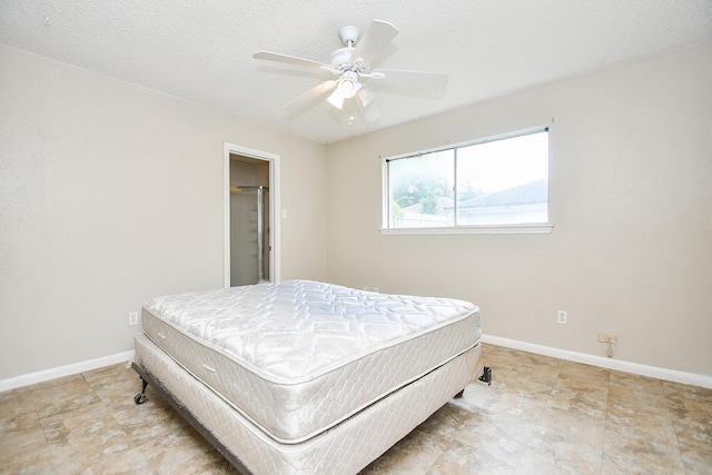 12618 Foxburo Dr, Houston, TX 77065 - bedroom featuring baseboards and ceiling fan
