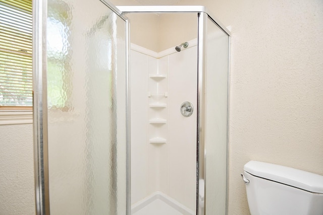 12618 Foxburo Dr, Houston, TX 77065 - bathroom featuring a stall shower and toilet