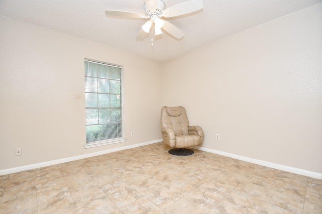 12618 Foxburo Dr, Houston, TX 77065 - unfurnished room featuring a textured ceiling, a ceiling fan, and baseboards
