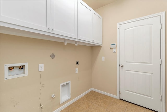 1938 Honey Laurel Dr, Conroe, TX 77304 - washroom featuring gas dryer hookup, electric dryer hookup, cabinet space, washer hookup, and baseboards