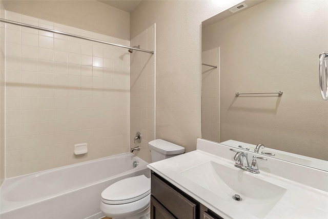 1938 Honey Laurel Dr, Conroe, TX 77304 - bathroom featuring toilet, tub / shower combination, and vanity