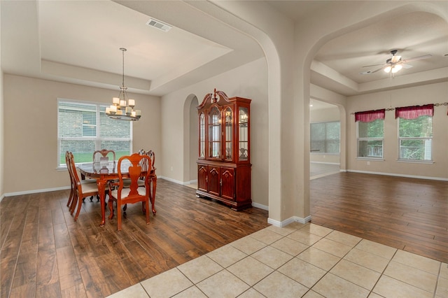 1938 Honey Laurel Dr, Conroe, TX 77304 - dining area featuring a raised ceiling, wood-type flooring, and ceiling fan
