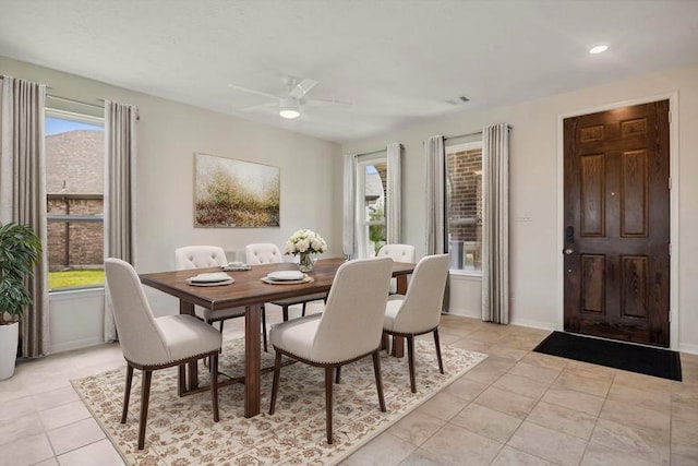 9001 Cimarron River Ln, Magnolia, TX 77354 - dining area featuring light tile patterned flooring, a ceiling fan, baseboards, and recessed lighting