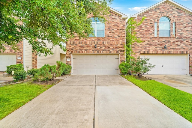 5202 Dartmoor Ridge Trl, Houston, TX 77066 - view of front facade with a garage, driveway, and brick siding