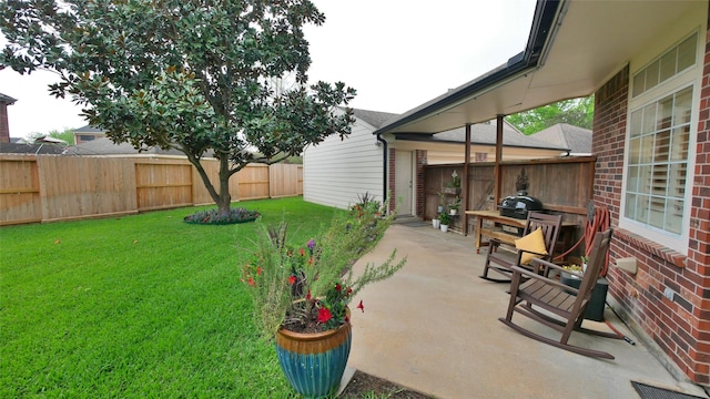 7907 Gulf Isle Ct NE, Houston, TX 77095 - view of yard with a patio area