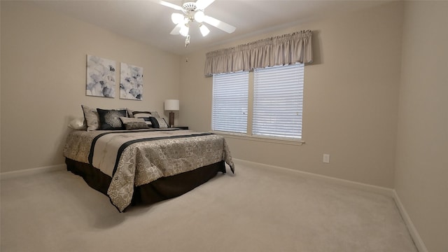 7907 Gulf Isle Ct NE, Houston, TX 77095 - bedroom with baseboards, carpet flooring, and a ceiling fan