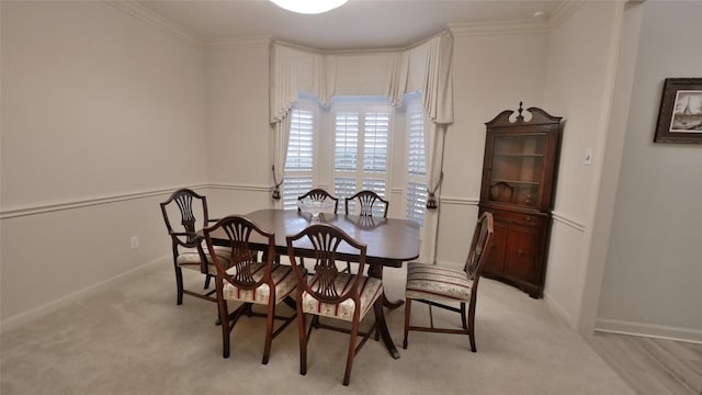 7907 Gulf Isle Ct NE, Houston, TX 77095 - dining room featuring baseboards, light carpet, and crown molding