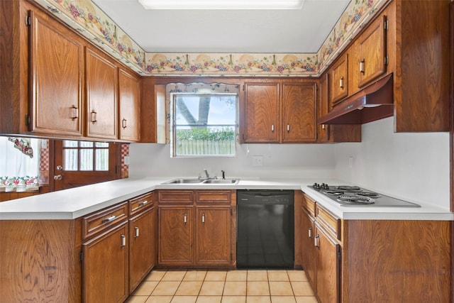 12939 Westhorpe Dr, Houston, TX 77077 - kitchen featuring black dishwasher, electric stovetop, under cabinet range hood, a peninsula, and a sink