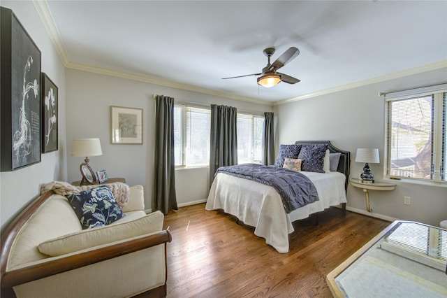 2500 Glen Hvn, Houston, TX 77030 - bedroom featuring multiple windows, wood finished floors, ornamental molding, baseboards, and a ceiling fan