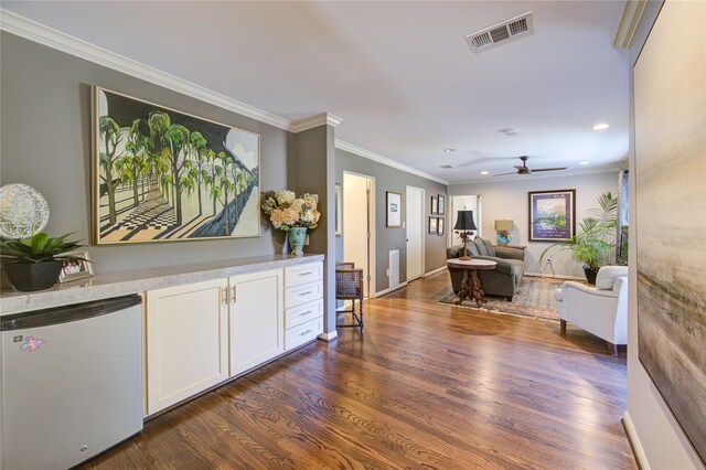 2500 Glen Hvn, Houston, TX 77030 - interior space with dark wood finished floors, recessed lighting, crown molding, a ceiling fan, and baseboards