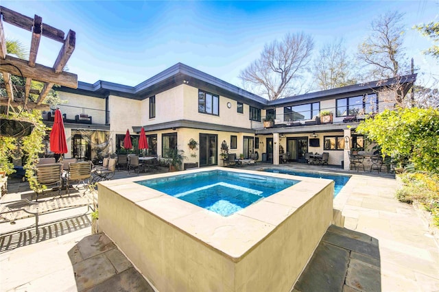 2500 Glen Hvn, Houston, TX 77030 - view of pool with an in-ground hot tub, a patio area, and outdoor dining space