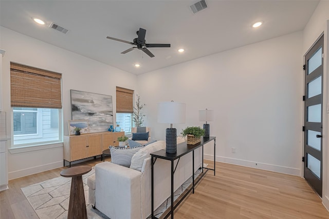 2706 Bostic St, Houston, TX 77093 - living area featuring light wood-type flooring, plenty of natural light, a ceiling fan, baseboards, and recessed lighting