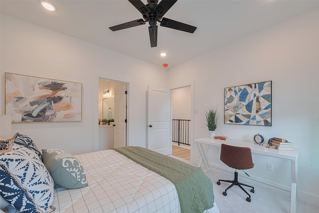 2706 Bostic St, Houston, TX 77093 - bedroom featuring light carpet, an office area, recessed lighting, ceiling fan, and baseboards