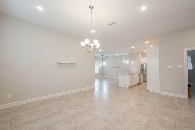 8107 Silverspot Ln, Missouri City, TX 77459 - unfurnished living room featuring a chandelier, recessed lighting, light tile patterned flooring, baseboards, and a sink