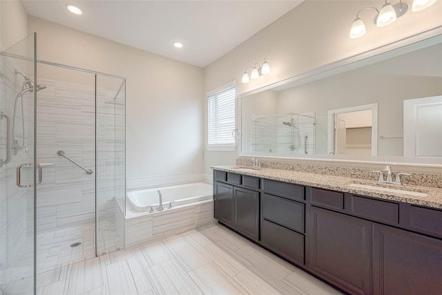 8107 Silverspot Ln, Missouri City, TX 77459 - full bathroom featuring a garden tub, a stall shower, double vanity, recessed lighting, and tile patterned flooring