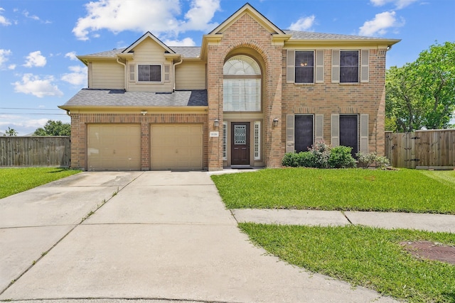 18206 Noble Forest Dr, Humble, TX 77346 - view of front facade with an attached garage, brick siding, a shingled roof, and concrete driveway