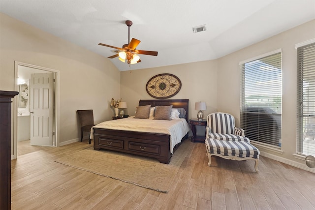 18206 Noble Forest Dr, Humble, TX 77346 - bedroom featuring light wood-type flooring, vaulted ceiling, baseboards, and ceiling fan