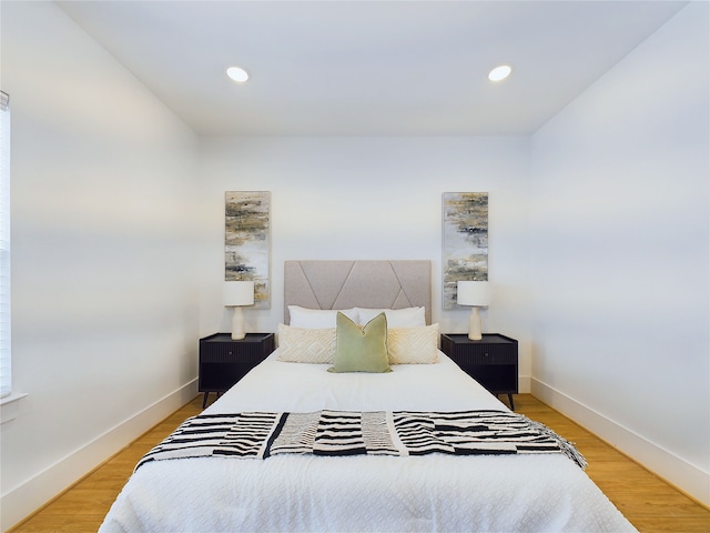6834 Lozier St, Houston, TX 77021 - bedroom featuring recessed lighting, baseboards, and light wood finished floors