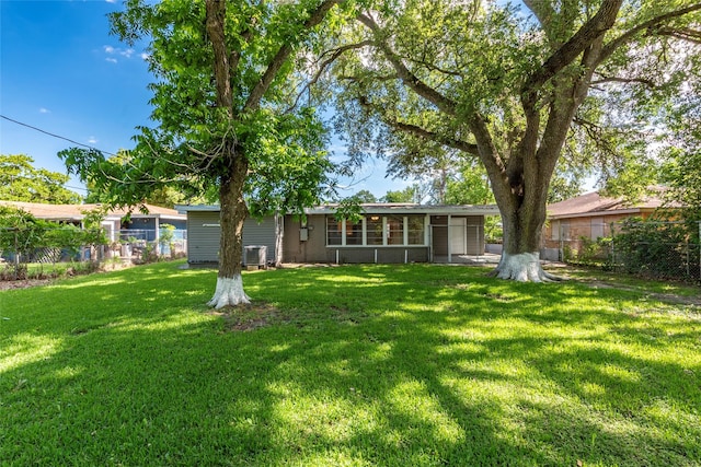 2910 John St, La Marque, TX 77568 - rear view of property with central AC unit