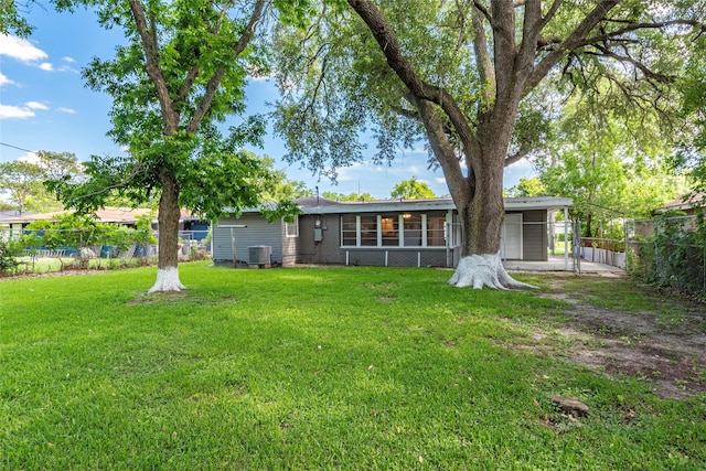 2910 John St, La Marque, TX 77568 - rear view of property with central air condition unit